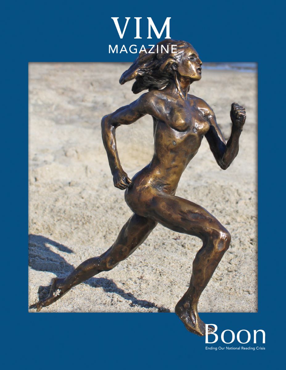 Statue of woman running on the beach